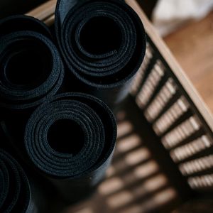 Close up of a rolled black eco-friendly yoga mat